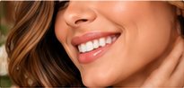 Woman smiling, side angle